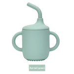 A cup with a silicone straw