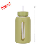 Insulated borosilicate glass cup with straw lid and silicone sleeve