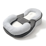 Sloping pad baby recliner to prevent spitting up milk