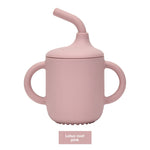 A cup with a silicone straw